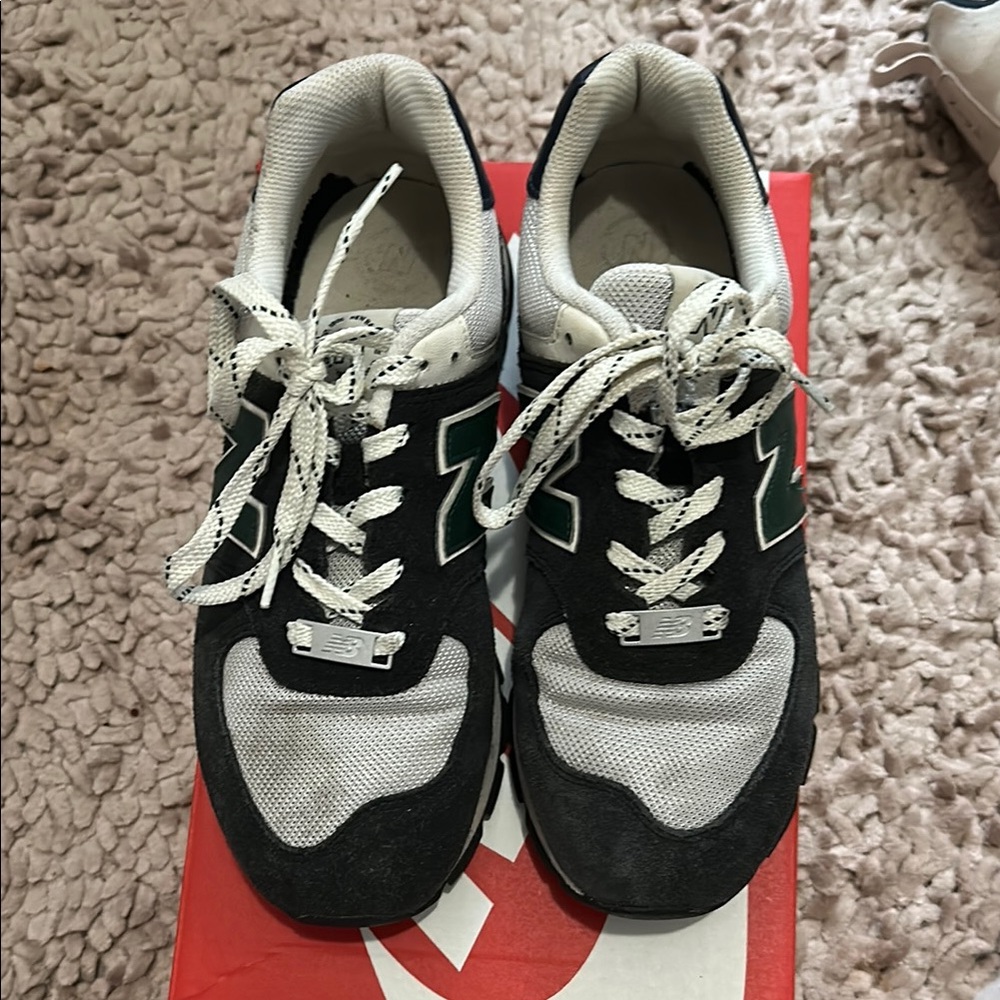 New Balance Black, White, and Green Sneakers